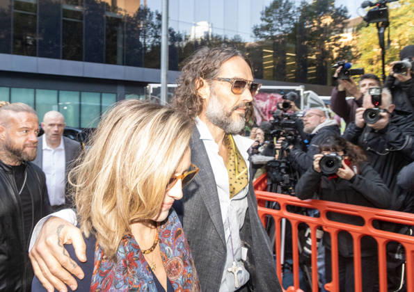October 19, 2026, London, England, United Kingdom: RUSSELL BRAND with his wife LAURA ((nÃ e GALLACHER ) arrives at Southwark Crown Court, where he is facing three charges of rape, indecent assault, and three counts of sexual assault, relating to six women. London United Kingdom - ZUMAs262 20261019_zip_s262_007 Copyright: xTayfunxSalcix