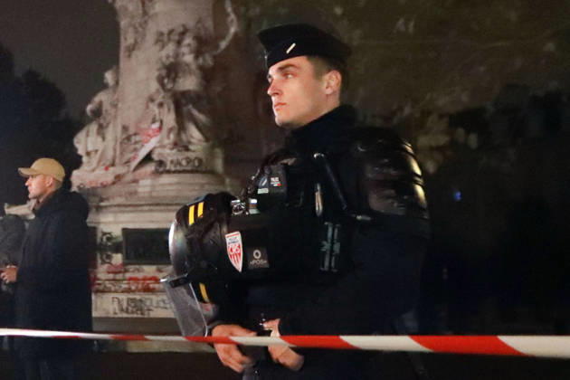 Protests in France Police keep guard in the Place de la Republique in Paris on Oct. 19, 2026, as overnight curfew issued in the square following rioting in France.  A14AA0005631287P