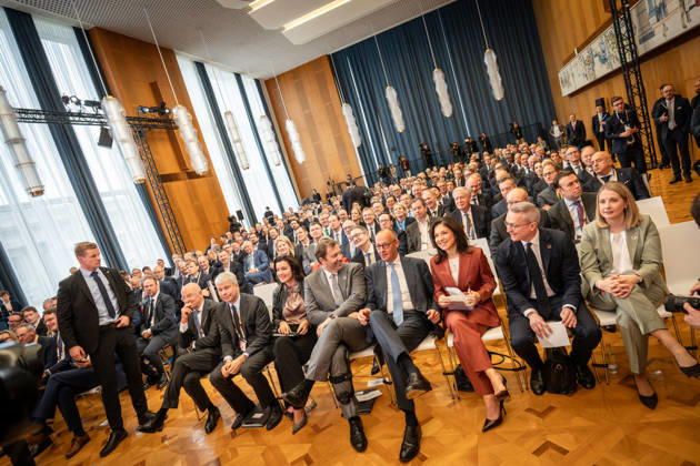 Martin Blessing, Steffen Bilger, Dorothee Bär, Lars Klingbeil, Friedrich Merz, Katherina Reiche, Karsten Wildberger, Verena Hubertz—First row from the left in the former State Council building of the GDR, the German federal government promotes international investment at the Invest in Germany Summit 2026 at the ESMT European School of Management and Te