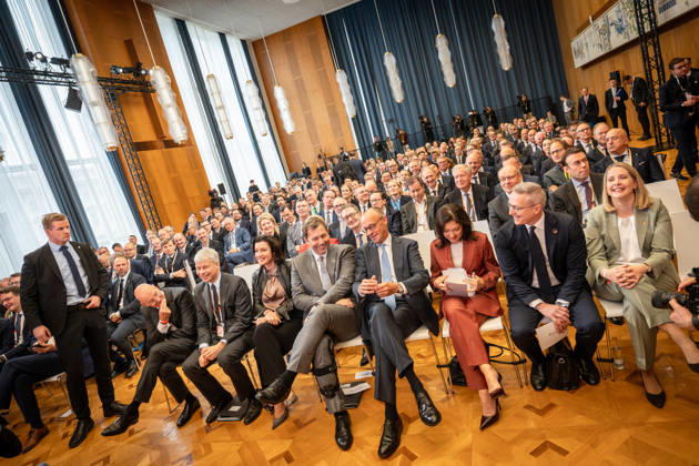 Martin Blessing, Steffen Bilger, Dorothee Bär, Lars Klingbeil, Friedrich Merz, Katherina Reiche, Karsten Wildberger, Verena Hubertz—First row from the left in the former State Council building of the GDR, the German federal government promotes international investment at the Invest in Germany Summit 2026 at the ESMT European School of Management and Te