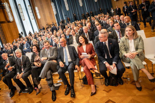 Martin Blessing, Steffen Bilger, Dorothee Bär, Lars Klingbeil, Friedrich Merz, Katherina Reiche, Karsten Wildberger, Verena Hubertz—First row from the left in the former State Council building of the GDR, the German federal government promotes international investment at the Invest in Germany Summit 2026 at the ESMT European School of Management and Te