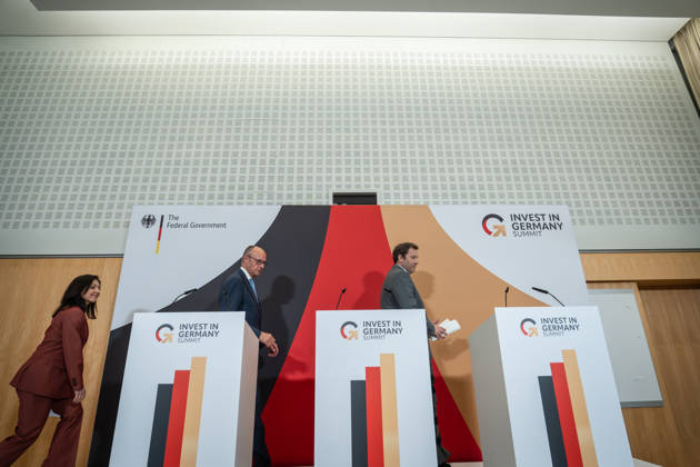 Katherina Reiche, Federal Minister of Economics; Friedrich Merz, Federal Chancellor; and Lars Klingbeil, Federal Minister of Finance (from left) during the closing remarks at the Invest in Germany Summit 2026 at the ESMT European School of Management and Technology in Berlin, Berlin, Germany; ESMT Berlin