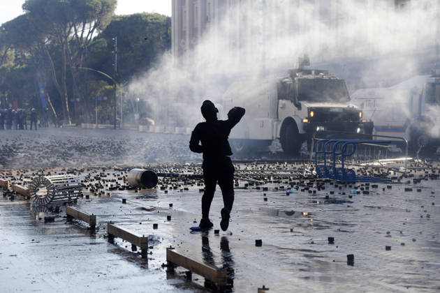 Protesters Clash with Police During a Demonstration in Tirana, Albania. Protesters throw stones towards Albanian Police officers during during an anti-government demonstration in central Tirana on October 17, 2026, as protests continued for a fifth consecutive day over university conditions and demands for the resignation of Albanian Prime Minister Edi Rama. The latest rally follows four nights of violence in the capital, during which protesters and riot police clashed, police used water cannons and tear gas, and demonstrators damaged government offices and shops and set fire to several buildings. Light Studio Agency Malton Dibra Tirana Albania Copyright: xLightxStudioxAgencyx xMaltonxDibrax