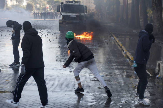 Protesters Clash with Police During a Demonstration in Tirana, Albania. Protesters throw molotov cocktails towards Albanian Police officers during during an anti-government demonstration in central Tirana on October 17, 2026, as protests continued for a fifth consecutive day over university conditions and demands for the resignation of Albanian Prime Minister Edi Rama. The latest rally follows four nights of violence in the capital, during which protesters and riot police clashed, police used water cannons and tear gas, and demonstrators damaged government offices and shops and set fire to several buildings. Light Studio Agency Malton Dibra Tirana Albania Copyright: xLightxStudioxAgencyx xMaltonxDibrax