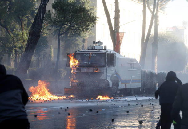 Protesters Clash with Police During a Demonstration in Tirana, Albania. Protesters throw molotov cocktails towards Albanian Police officers during during an anti-government demonstration in central Tirana on October 17, 2026, as protests continued for a fifth consecutive day over university conditions and demands for the resignation of Albanian Prime Minister Edi Rama. The latest rally follows four nights of violence in the capital, during which protesters and riot police clashed, police used water cannons and tear gas, and demonstrators damaged government offices and shops and set fire to several buildings. Light Studio Agency Malton Dibra Tirana Albania Copyright: xLightxStudioxAgencyx xMaltonxDibrax