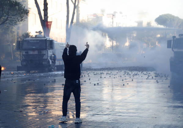 Protesters Clash with Police During a Demonstration in Tirana, Albania. Protesters throw molotov cocktails towards Albanian Police officers during during an anti-government demonstration in central Tirana on October 17, 2026, as protests continued for a fifth consecutive day over university conditions and demands for the resignation of Albanian Prime Minister Edi Rama. The latest rally follows four nights of violence in the capital, during which protesters and riot police clashed, police used water cannons and tear gas, and demonstrators damaged government offices and shops and set fire to several buildings. Light Studio Agency Malton Dibra Tirana Albania Copyright: xLightxStudioxAgencyx xMaltonxDibrax