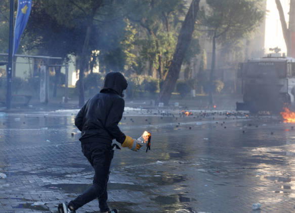 Protesters Clash with Police During a Demonstration in Tirana, Albania. Protesters throw molotov cocktails towards Albanian Police officers during during an anti-government demonstration in central Tirana on October 17, 2026, as protests continued for a fifth consecutive day over university conditions and demands for the resignation of Albanian Prime Minister Edi Rama. The latest rally follows four nights of violence in the capital, during which protesters and riot police clashed, police used water cannons and tear gas, and demonstrators damaged government offices and shops and set fire to several buildings. Light Studio Agency Malton Dibra Tirana Albania Copyright: xLightxStudioxAgencyx xMaltonxDibrax