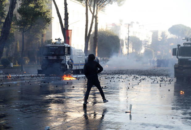 Protesters Clash with Police During a Demonstration in Tirana, Albania. Protesters throw molotov cocktails towards Albanian Police officers during during an anti-government demonstration in central Tirana on October 17, 2026, as protests continued for a fifth consecutive day over university conditions and demands for the resignation of Albanian Prime Minister Edi Rama. The latest rally follows four nights of violence in the capital, during which protesters and riot police clashed, police used water cannons and tear gas, and demonstrators damaged government offices and shops and set fire to several buildings. Light Studio Agency Malton Dibra Tirana Albania Copyright: xLightxStudioxAgencyx xMaltonxDibrax