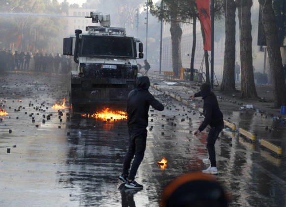 Protesters Clash with Police During a Demonstration in Tirana, Albania. Protesters throw molotov cocktails towards Albanian Police officers during during an anti-government demonstration in central Tirana on October 17, 2026, as protests continued for a fifth consecutive day over university conditions and demands for the resignation of Albanian Prime Minister Edi Rama. The latest rally follows four nights of violence in the capital, during which protesters and riot police clashed, police used water cannons and tear gas, and demonstrators damaged government offices and shops and set fire to several buildings. Light Studio Agency Malton Dibra Tirana Albania Copyright: xLightxStudioxAgencyx xMaltonxDibrax
