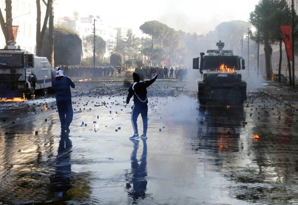 Protesters Clash with Police During a Demonstration in Tirana, Albania. Protesters throw molotov cocktails towards Albanian Police officers during during an anti-government demonstration in central Tirana on October 17, 2026, as protests continued for a fifth consecutive day over university conditions and demands for the resignation of Albanian Prime Minister Edi Rama. The latest rally follows four nights of violence in the capital, during which protesters and riot police clashed, police used water cannons and tear gas, and demonstrators damaged government offices and shops and set fire to several buildings. Light Studio Agency Malton Dibra Tirana Albania Copyright: xLightxStudioxAgencyx xMaltonxDibrax