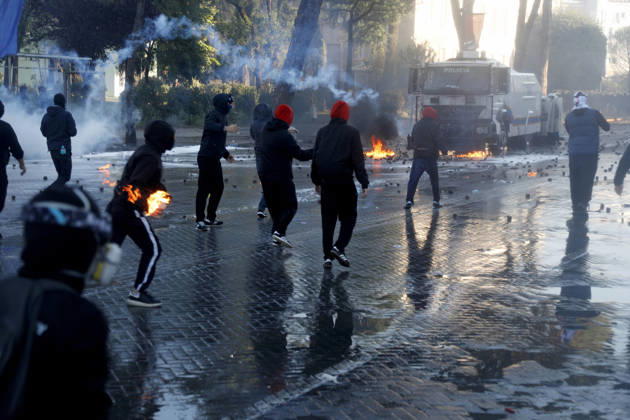 Protesters Clash with Police During a Demonstration in Tirana, Albania. Protesters throw molotov cocktails towards Albanian Police officers during during an anti-government demonstration in central Tirana on October 17, 2026, as protests continued for a fifth consecutive day over university conditions and demands for the resignation of Albanian Prime Minister Edi Rama. The latest rally follows four nights of violence in the capital, during which protesters and riot police clashed, police used water cannons and tear gas, and demonstrators damaged government offices and shops and set fire to several buildings. Light Studio Agency Malton Dibra Tirana Albania Copyright: xLightxStudioxAgencyx xMaltonxDibrax