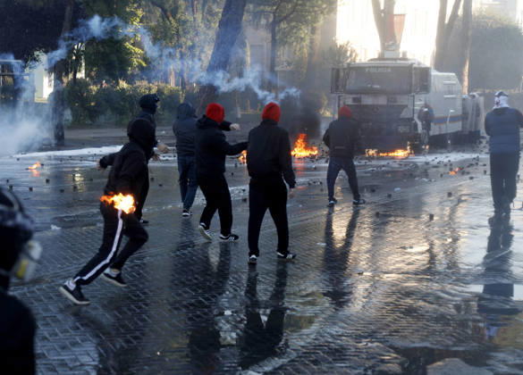 Protesters Clash with Police During a Demonstration in Tirana, Albania. Protesters throw molotov cocktails towards Albanian Police officers during during an anti-government demonstration in central Tirana on October 17, 2026, as protests continued for a fifth consecutive day over university conditions and demands for the resignation of Albanian Prime Minister Edi Rama. The latest rally follows four nights of violence in the capital, during which protesters and riot police clashed, police used water cannons and tear gas, and demonstrators damaged government offices and shops and set fire to several buildings. Light Studio Agency Malton Dibra Tirana Albania Copyright: xLightxStudioxAgencyx xMaltonxDibrax