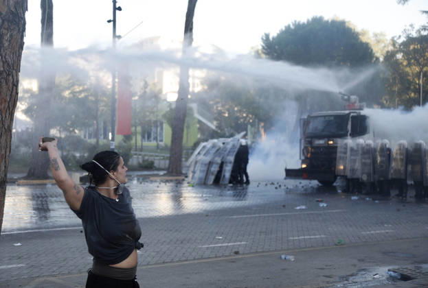 Protesters Clash with Police During a Demonstration in Tirana, Albania. Protesters throw stones towards Albanian Police officers during during an anti-government demonstration in central Tirana on October 17, 2026, as protests continued for a fifth consecutive day over university conditions and demands for the resignation of Albanian Prime Minister Edi Rama. The latest rally follows four nights of violence in the capital, during which protesters and riot police clashed, police used water cannons and tear gas, and demonstrators damaged government offices and shops and set fire to several buildings. Light Studio Agency Malton Dibra Tirana Albania Copyright: xLightxStudioxAgencyx xMaltonxDibrax