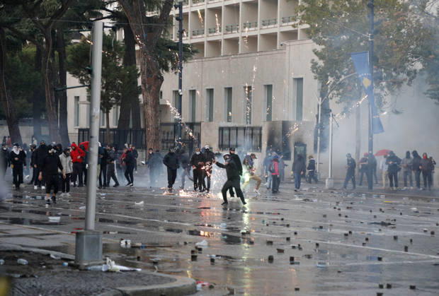 Protesters Clash with Police During a Demonstration in Tirana, Albania. Protesters throw stones towards Albanian Police officers during during an anti-government demonstration in central Tirana on October 17, 2026, as protests continued for a fifth consecutive day over university conditions and demands for the resignation of Albanian Prime Minister Edi Rama. The latest rally follows four nights of violence in the capital, during which protesters and riot police clashed, police used water cannons and tear gas, and demonstrators damaged government offices and shops and set fire to several buildings. Light Studio Agency Malton Dibra Tirana Albania Copyright: xLightxStudioxAgencyx xMaltonxDibrax