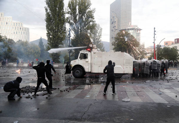 Protesters Clash with Police During a Demonstration in Tirana, Albania. Protesters throw stones towards Albanian Police officers during during an anti-government demonstration in central Tirana on October 17, 2026, as protests continued for a fifth consecutive day over university conditions and demands for the resignation of Albanian Prime Minister Edi Rama. The latest rally follows four nights of violence in the capital, during which protesters and riot police clashed, police used water cannons and tear gas, and demonstrators damaged government offices and shops and set fire to several buildings. Light Studio Agency Malton Dibra Tirana Albania Copyright: xLightxStudioxAgencyx xMaltonxDibrax