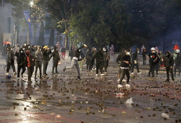 Protesters Clash with Police During a Demonstration in Tirana, Albania. Protesters clash with riot police during an anti-government demonstration in central Tirana on October 17, 2026, as protests continued for a fifth consecutive day over university conditions and demands for the resignation of Albanian Prime Minister Edi Rama. The latest rally follows four nights of violence in the capital, during which protesters and riot police clashed, police used water cannons and tear gas, and demonstrators damaged government offices and shops and set fire to several buildings. Light Studio Agency Malton Dibra Tirana Albania Copyright: xLightxStudioxAgencyx xMaltonxDibrax