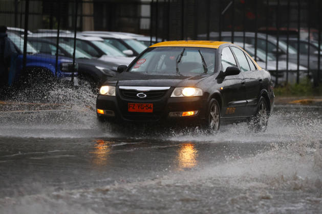 Santiago, October 20, 2026: Flooding at the intersection of Irarrazaval and Lo Encalada streets during the storm system affecting the metropolitan region. Jonnathan Oyarzun, Aton Chile, Santiago, Chile. Aton 1201197  Copyright: JONNATHANxOYARZUN ATONxCHILE