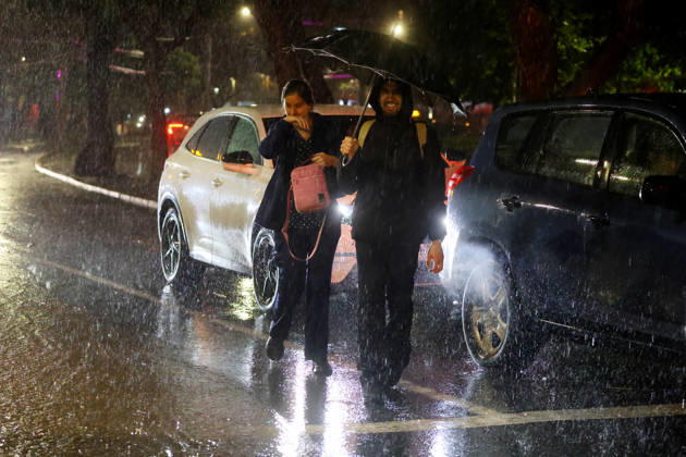 Santiago, October 20, 2026: A flooded street at the intersection of Camino el Alba and Apoquindo during the storm affecting the metropolitan region. Jonnathan Oyarzun, Aton Chile, Santiago, Chile. Aton 1201261  Copyright: JONNATHANxOYARZUN ATONxCHILE