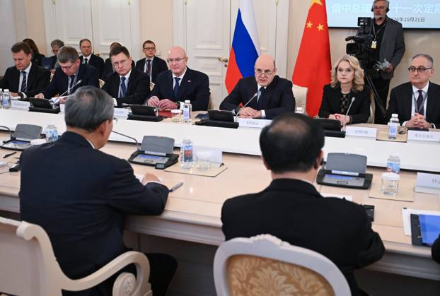 Russia China 9269449 21.10.2026 Russian Prime Minister Mikhail Mishustin attends a narrow format meeting with Chinese Premier Li Qiang, as Russian Minister for the Development of the Far East and the Arctic Alexey Chekunkov, Economic Development Minister Maxim Reshetnikov, Deputy Prime Ministers Alexander Novak, Tatyana Golikova and Russian Ambassador to China Igor Morgulov sit nearby, at the Boris Yeltsin Presidential Library in St. Petersburg, Russia. Alexander Miridonov Sputnik St. Petersburg Russia  Copyright: xAlexanderxMiridonovx