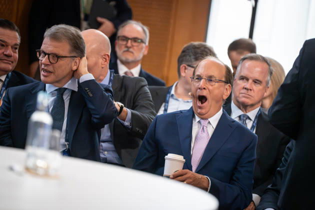 Larry Fink (Laurence Douglas Fink) with Starbucks Coffee’s Pappbecker in the front row at the Berlin Global Dialogue in the former State Council building of the GDR; seated to his left is Christian Sewing, CEO of Deutsche Bank AG. Berlin Global Dialogue 2026 (BGD 2026), theme: Advancing Alliances for a New Era, Berlin, Berlin, Germany, ESMT