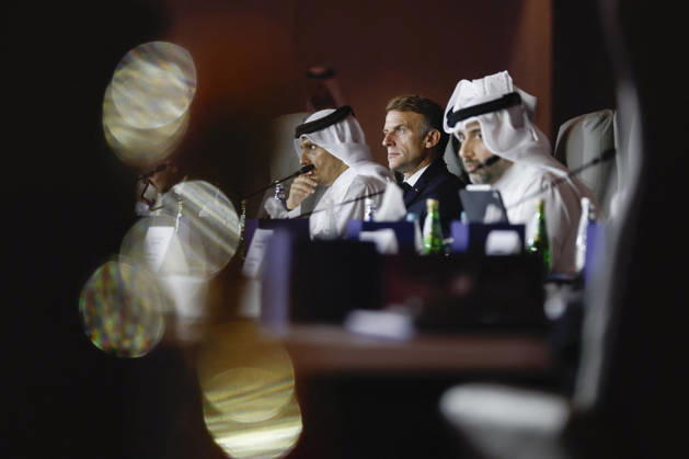 President Macron At The Opswf Summit During His Visit To Qatar French President Emmanuel Macron looks on alongside Qatari Prime Minister Sheikh Mohammed bin Abdulrahman Al Thani, as they attend the 9th Annual One Planet Sovereign Wealth Funds (OPSWF) Summit at the Rosewood Hotel in Lusail, Qatar, October 21, 2026. Photo by Benoit Tessier Pool ABACAPRESS.COM Lusail Qatar  Copyright: xTessierxBenoit Pool ABACAx