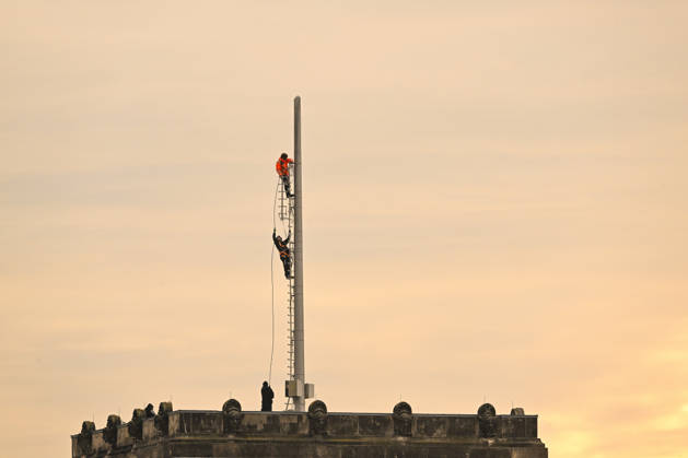 German national flag replaced atop Bundestag building in Berlin BERLIN, GERMANY - OCTOBER 21: Workers replace one of the German national flags atop the roof of the Bundestag (Federal Parliament) building in Berlin, Germany, on October 21, 2026. Staff hoisted the tricolor flag of black, red, and gold as part of routine maintenance on the historic Reichstag building. Halil Sagirkaya Anadolu Berlin Germany. Editorial use only. Please get in touch for any other usage.  Copyright: x2026xAnadoluxHalilxSagirkayax