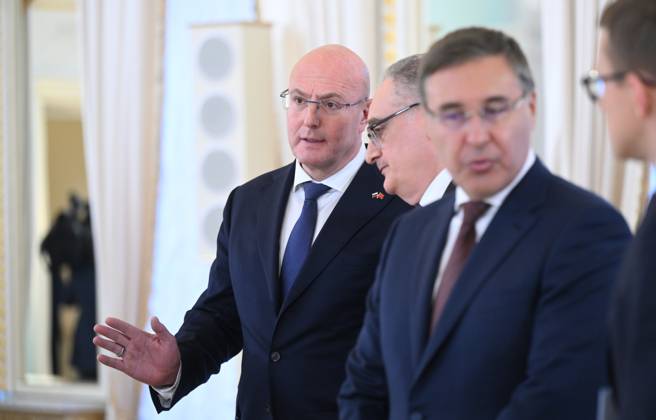 Russia Putin China 9269885 21.10.2026 From left, Russian Deputy Prime Minister Dmitry Chernyshenko, Russian Ambassador to China Igor Morgulov and Science and Higher Education Minister Valery Falkov wait before a meeting between Russian President Vladimir Putin and Chinese Premier Li Qiang at the Constantine Palace in Strelna, a suburb of St. Petersburg, Russia. Kristina Solovyova Sputnik St. Petersburg Russia  Copyright: xKristinaxSolovyovax
