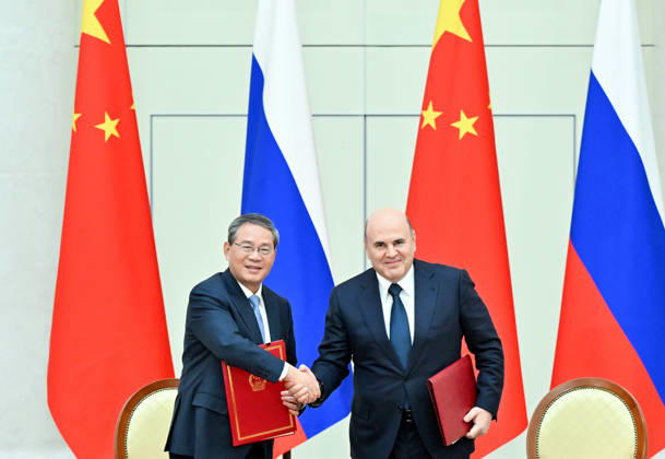 (261021) -- ST. PETERSBURG, Oct. 21, 2026 -- Chinese Premier Li Qiang and Russian Prime Minister Mikhail Mishustin sign a joint communique after the 31st regular meeting between Chinese and Russian heads of government in St. Petersburg, Russia, Oct. 21, 2026. Li Qiang co-chaired the meeting with Mikhail Mishustin on Wednesday. ) RUSSIA-ST. PETERSBURG-CHINA-LI QIANG-31ST REGULAR MEETING BETWEEN CHINESE AND RUSSIAN HEADS OF GOVERNMENT GaoxJie 