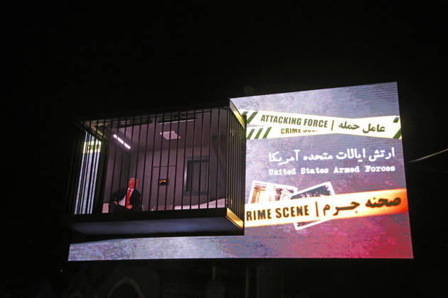 Actor impersonating Trump placed behind symbolic bars in Tehran TEHRAN, IRAN - OCTOBER 21: (RESTRICTIONS: No Access Israel Media Persian Language TV Stations Outside Iran Strictly No Access BBC Persian VOA Persian Manoto TV Iran International TV) An actor impersonating U.S. President Donald Trump stands behind symbolic prison bars set up inside an interactive billboard frame at Tajrish Square in Tehran, Iran. The installation drew significant attention from passersby and caused notable traffic congestion in the area as onlookers gathered to take photos. Fatemeh Bahrami Anadolu Tehran Iran. Editorial use only. Please get in touch for any other usage.  Copyright: x2026xAnadoluxFatemehxBahramix