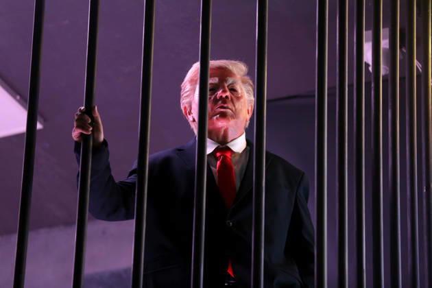 Actor impersonating Trump placed behind symbolic bars in Tehran TEHRAN, IRAN - OCTOBER 21: (RESTRICTIONS: No Access Israel Media Persian Language TV Stations Outside Iran Strictly No Access BBC Persian VOA Persian Manoto TV Iran International TV) An actor impersonating U.S. President Donald Trump stands behind symbolic prison bars set up inside an interactive billboard frame at Tajrish Square in Tehran, Iran. The installation drew significant attention from passersby and caused notable traffic congestion in the area as onlookers gathered to take photos. Fatemeh Bahrami Anadolu Tehran Iran. Editorial use only. Please get in touch for any other usage.  Copyright: x2026xAnadoluxFatemehxBahramix