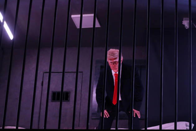 Actor impersonating Trump placed behind symbolic bars in Tehran TEHRAN, IRAN - OCTOBER 21: (RESTRICTIONS: No Access Israel Media Persian Language TV Stations Outside Iran Strictly No Access BBC Persian VOA Persian Manoto TV Iran International TV) An actor impersonating U.S. President Donald Trump stands behind symbolic prison bars set up inside an interactive billboard frame at Tajrish Square in Tehran, Iran. The installation drew significant attention from passersby and caused notable traffic congestion in the area as onlookers gathered to take photos. Fatemeh Bahrami Anadolu Tehran Iran. Editorial use only. Please get in touch for any other usage.  Copyright: x2026xAnadoluxFatemehxBahramix