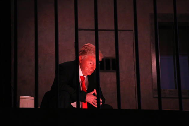 Actor impersonating Trump placed behind symbolic bars in Tehran TEHRAN, IRAN - OCTOBER 21: (RESTRICTIONS: No Access Israel Media Persian Language TV Stations Outside Iran Strictly No Access BBC Persian VOA Persian Manoto TV Iran International TV) An actor impersonating U.S. President Donald Trump stands behind symbolic prison bars set up inside an interactive billboard frame at Tajrish Square in Tehran, Iran. The installation drew significant attention from passersby and caused notable traffic congestion in the area as onlookers gathered to take photos. Fatemeh Bahrami Anadolu Tehran Iran. Editorial use only. Please get in touch for any other usage.  Copyright: x2026xAnadoluxFatemehxBahramix