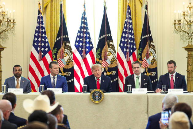 October 21, 2026, Washington, District Of Columbia, USA: United States President Donald J Trump, center, speaks as, from left to right: Kash Patel, Director, Federal Bureau of Investigation (FBI), US Secretary of War Pete Hegseth, US Attorney General Todd Blanche and US Secretary of Homeland Security (DHS) Markwayne Mullin, listen during a roundtable discussion on cybercrime in the East Room of the White House on October 21, 2026 in Washington, D.C. The administration is fighting back against foreign-based organized criminal organizations that exploit Americans in cyberspace and their scam centers and fraud schemes Washington USA - ZUMAs152 20261021_faa_s152_050 Copyright: xSamuelxCorumx-xPoolxviaxCNPx