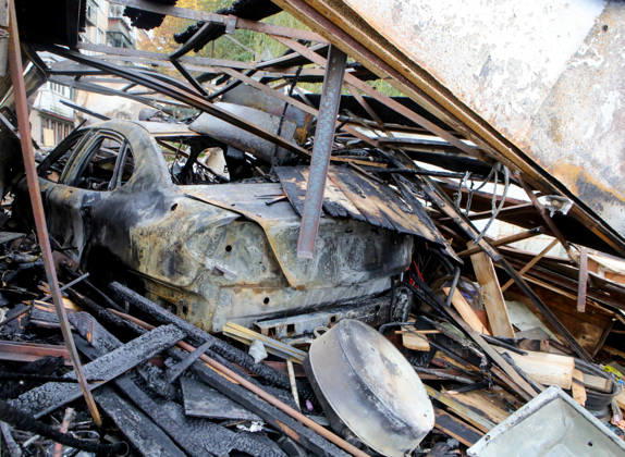 A burnt-out car is in a garage destroyed by a Russian drone attack, Petropavlivska Borshchahivka, Kyiv region, Ukraine, October 21, 2026. (Photo by Volodymyr Tarasov Ukrinform) Consequences of Russian drone attack in Kyiv region  Copyright: xVolodymyrxTarasovx