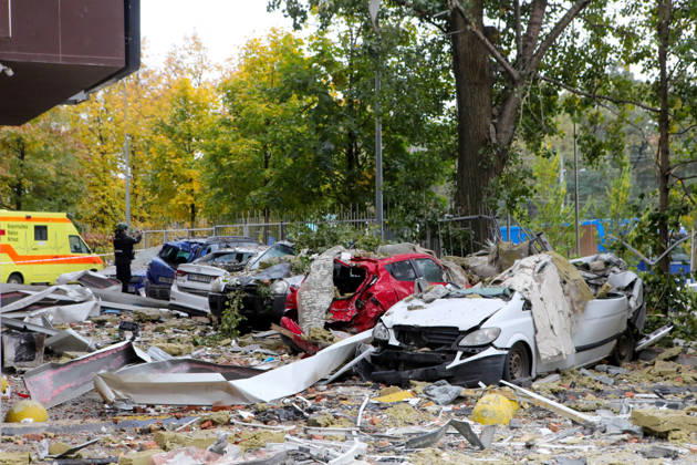 Rubble carpets the ground at a parking lot where cars were destroyed by a Russian drone strike on an apartment block in the Sviatoshynskyi district, Kyiv, Ukraine, October 21, 2026. The drone hit the building’s 20th floor, sparking a fire. Two people were killed in the attack. (Photo by Volodymyr Tarasov Ukrinform) Russian drone hits 24-storey apartment block in Kyiv  Copyright: xVolodymyrxTarasovx
