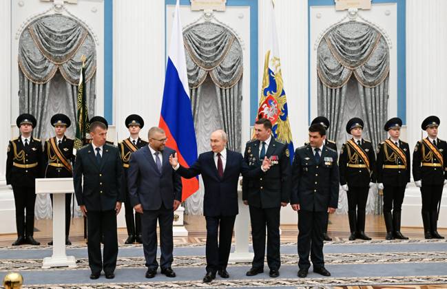 Russia Putin Federal Customs Service 9270447 22.10.2026 Russian President Vladimir Putin and Federal Customs Service head Valery Pikalev, 2nd left, attend a ceremony to present the agency with its banner at the Kremlin in Moscow, Russia. Pelagiya Tikhonova Sputnik Moscow Russia  Copyright: xPelagiyaxTikhonovax