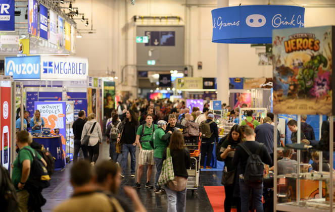 Visitors in the exhibition halls on October 22, 2026, at the SPIEL Essen trade show, held from October 22–25, 2026, in Essen, Germany, at the Grugahalle