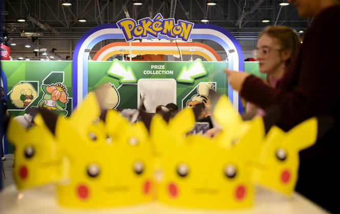 The Pokémon Company booth, Pokémon masks, trading card games, on October 22, 2026, at the SPIEL Essen trade show from October 22–25, 2026, in Essen, Germany, at the Grugahalle