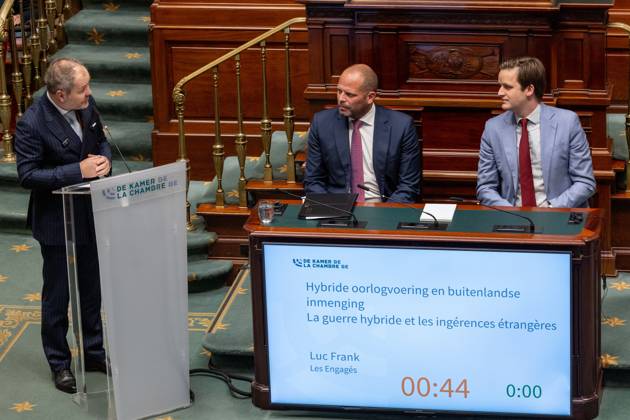 Les Engages Luc Frank; Minister of Defence and Foreign Trade Theo Francken and N-VA s Jeroen Bergers pictured during a plenary session of the Chamber at the federal parliament in Brussels, Thursday 22 October 2026.  NICOLASxMAETERLINCK 190657286