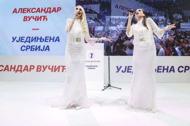 SERBIA, BELGRADE - OCTOBER 22, 2026: Women perform during a rally at the Ranko Zeravica Sports Hall in support of Serbia s former President Aleksandar Vucic ahead of the 2026 Serbian parliamentary election scheduled for October 25. Vucic will head the list of the ruling Serbian Progressive Party (SNS) and run as its prime ministerial candidate Belgrade Serbia  - ZUMAt113 20261022_zaa_t113_511 Copyright: xAlexanderxRyuminx