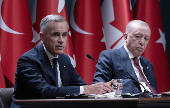 October 22, 2026, Ankara, Turkey: Turkish President Recep Tayyip Erdogan, right, looks on as Prime Minister Mark Carney delivers his statement in Ankara, Turkey on Thursday, Oct. 22, 2026. Ankara Turkey  - ZUMAc35_ 20261022_zaf_c35_049 Copyright: xAdrianxWyldx