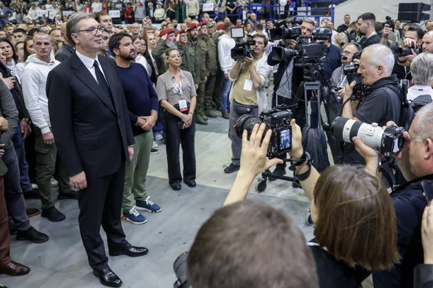 SERBIA, BELGRADE - OCTOBER 22, 2026: Serbia s former President Aleksandar Vucic (L front) attends a rally at the Ranko Zeravica Sports Hall ahead of the 2026 Serbian parliamentary election scheduled for October 25. Vucic will head the list of the ruling Serbian Progressive Party (SNS) and run as its prime ministerial candidate. Alexander Ryumin TASS 99768655