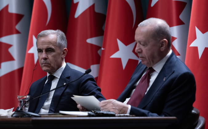 October 22, 2026, Ankara, Turkey: Prime Minister Mark Carney, left, looks on as Turkish President Recep Tayyip Erdogan reads his statement in Ankara, Turkey on Thursday, Oct. 22, 2026. Ankara Turkey  - ZUMAc35_ 20261022_zaf_c35_059 Copyright: xAdrianxWyldx