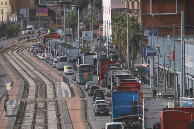 Truck Drivers Strike - Naples Truck drivers and supporters block one lane of Via Nuova Marina in Naples, Italy on October 22, 2026, during a strike against rising fuel costs that has disrupted port access at the Bausan entrance. Photo by Napolipress IPA ABACAPRESS.COM Naples Italy  Copyright: xIPA ABACAx