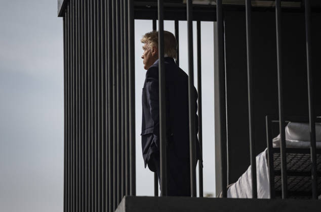 Anti-U.S. President Trump Performance On Billboard Reactions An Iranian masked man performs as U.S. President Donald Trump inside a symbolic cell mounted on a billboard in northern Tehran, Iran, on October 22, 2026, amid escalating tensions between Iran and the United States. Tehran Tehran Iran  Copyright: xMortezaxNikoubazlx originalFilename: nikoubazl-antiuspr261022_npSvk.jpg