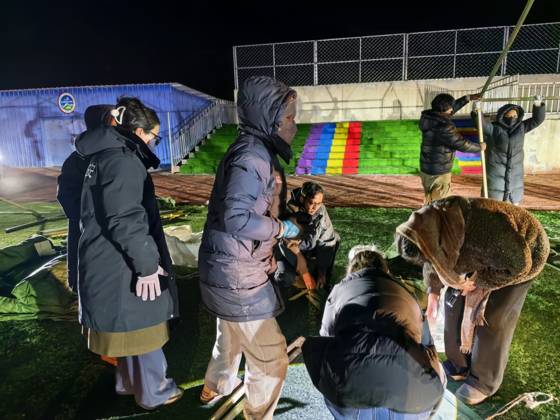 (261023) -- NAGQU, Oct. 23, 2026 -- Tents are being set up for quake-affected residents at a primary school in Baqen County of Nagqu City, southwest China s Xizang Autonomous Region, Oct. 23, 2026. Sixteen people were killed and 32 others injured after a 7.0-magnitude earthquake struck Baqen County of Nagqu City in southwest China s Xizang Autonomous Region at 10:33 p.m. Thursday (Beijing Time), according to the city s emergency management bureau. The damage caused by the quake is being further evaluated, and disaster relief work is underway. Xizang has activated a Level-II earthquake disaster emergency response, according to the regional emergency command center. (SpotNews) CHINA-XIZANG-NAGQU-EARTHQUAKE-DISASTER EMERGENCY RESPONSE 