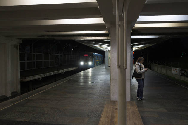 Kyiv Metro Station Partially Reopens After October 19 Russian Attack A woman stands on the platform as a train arrives at the Chernihivska metro station, which has partially resumed operations following a Russian attack on October 19, Kyiv, Ukraine, October 22, 2026. The massive strike damaged the station, tracks and the cable network. Photo by Kyrylo Chubotin Ukrinform ABACAPRESS.COM Kyiv Ukraine  Copyright: xChubotinxKirill Ukrinform ABACAx