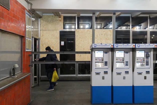 Kyiv Metro Station Partially Reopens After October 19 Russian Attack A man passes OSB panels, replacing shattered windows at the Chernihivska metro station, which has partially resumed operations following a Russian attack on October 19, Kyiv, Ukraine, October 22, 2026. The massive strike damaged the station, tracks and the cable network. Photo by Kyrylo Chubotin Ukrinform ABACAPRESS.COM Kyiv Ukraine  Copyright: xChubotinxKirill Ukrinform ABACAx