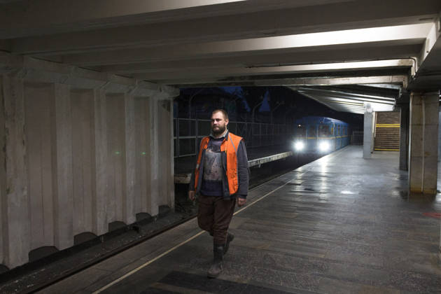 Kyiv Metro Station Partially Reopens After October 19 Russian Attack A worker in an orange vest walks along the platform as a train arrives at the Chernihivska metro station, which has partially resumed operations following a Russian attack on October 19, Kyiv, Ukraine, October 22, 2026. The massive strike damaged the station, tracks and the cable network. Photo by Kyrylo Chubotin Ukrinform ABACAPRESS.COM Kyiv Ukraine  Copyright: xChubotinxKirill Ukrinform ABACAx