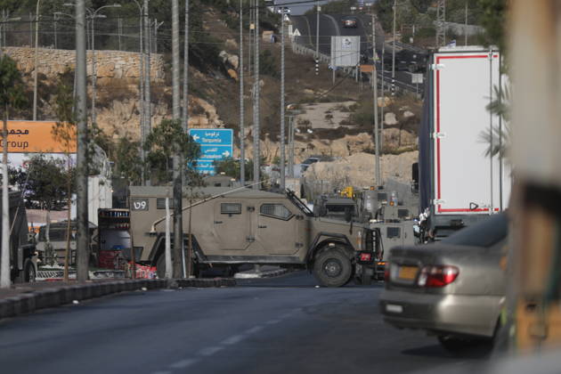 Israeli forces kill two Palestinians in Farsh Al Hawa area of Hebron HEBRON, WEST BANK, PALESTINE - OCTOBER 23: Israeli forces stand guard in the Farsh Al Hawa area at the northern entrance to Hebron after Israeli soldiers shot and killed two Palestinians alleging they had launched an attack targeting Israelis in the vicinity before sealing off the area with military security cordons in West Bank, Palestine on October 23, 2026. Mamoun Wazwaz Anadolu Hebron West Bank. Editorial use only. Please get in touch for any other usage.  Copyright: x2026xAnadoluxMamounxWazwazx